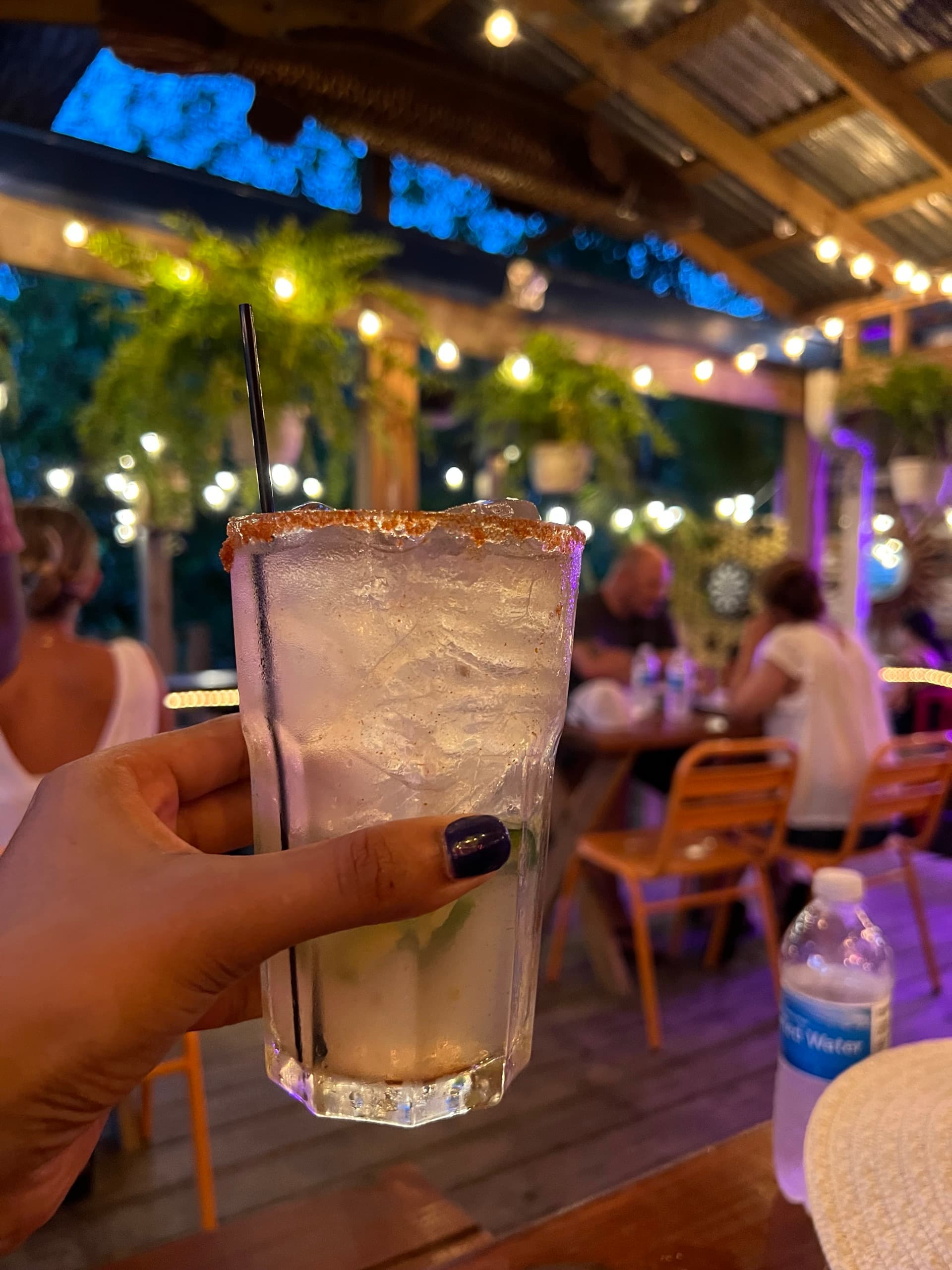 Cocktail with string lights at Zaco's